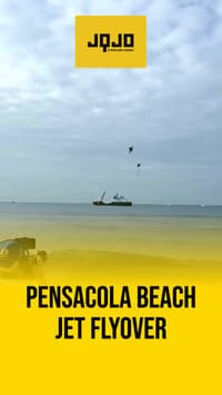 Pensacola jet flyover sends sand flying on beach