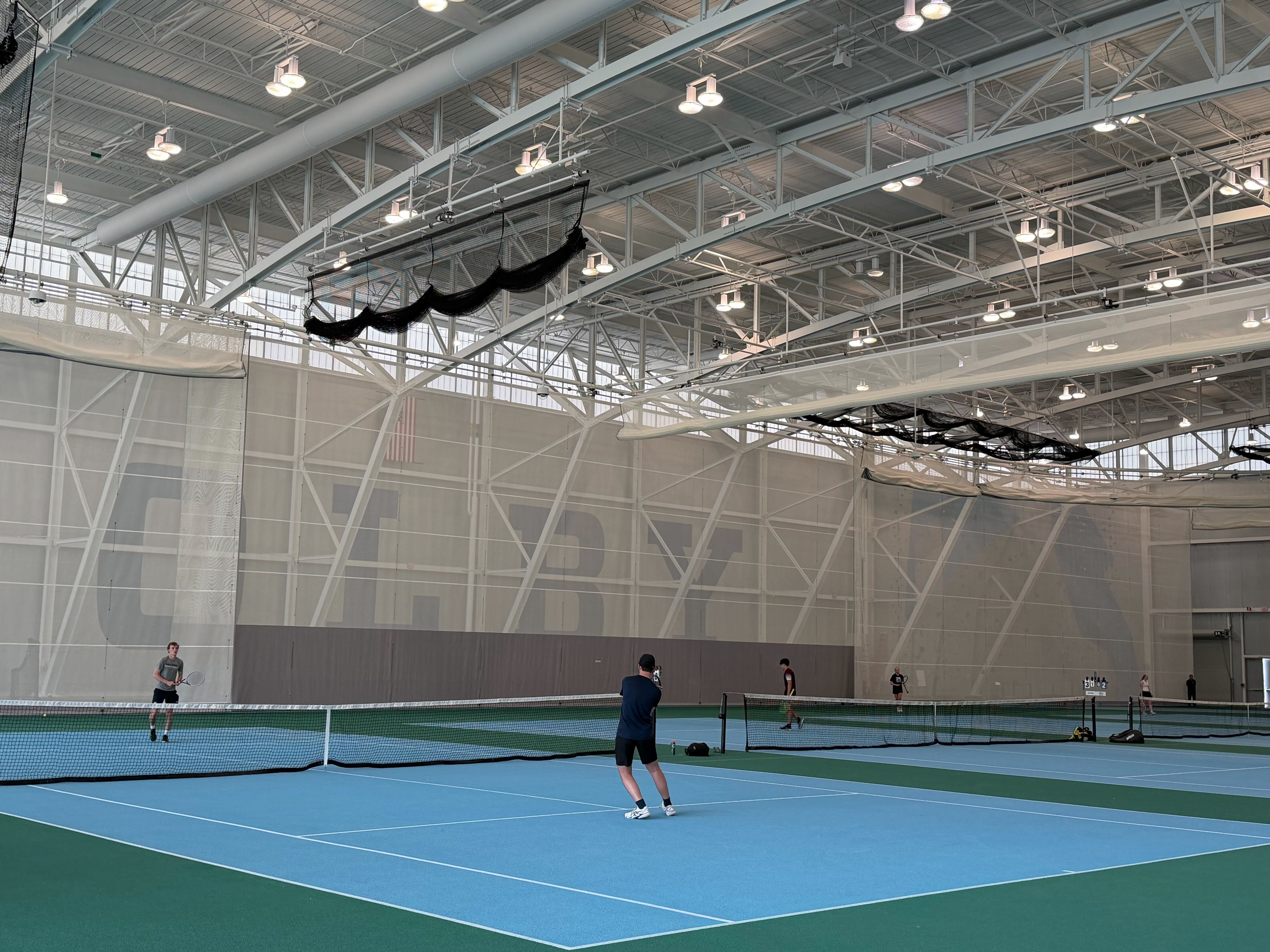 Top seeds advance as Maine high school tennis shifts venues