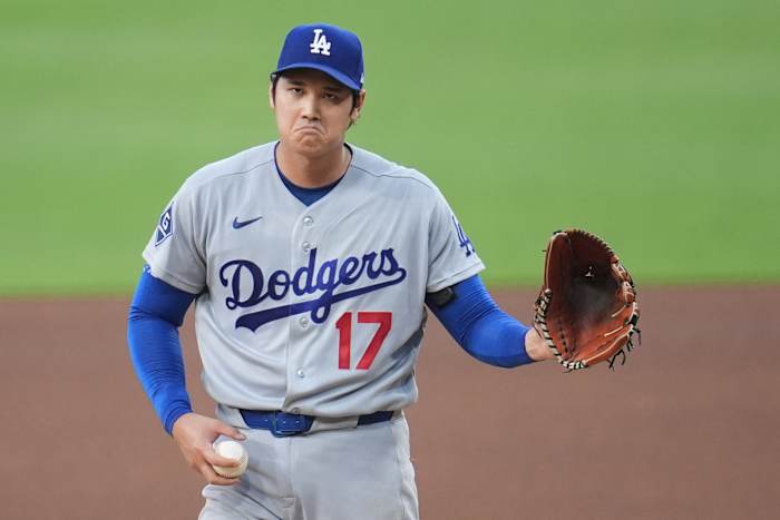 Ohtani homers, pitches five, leads Dodgers to victory
