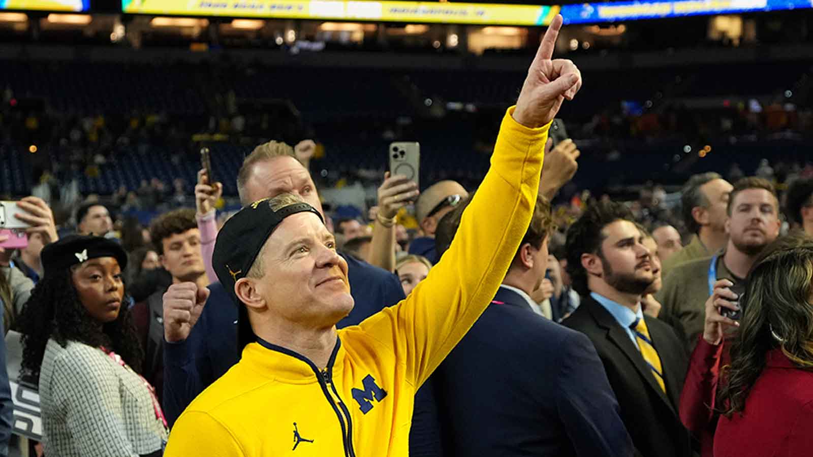 Michigan retains J.P. Estrella after Dusty May exit
