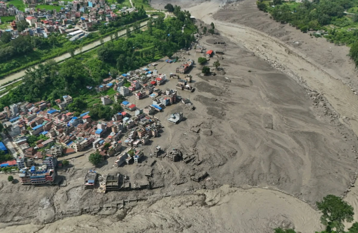 At least 160 killed and hundreds missing after flash floods in Nepal and China