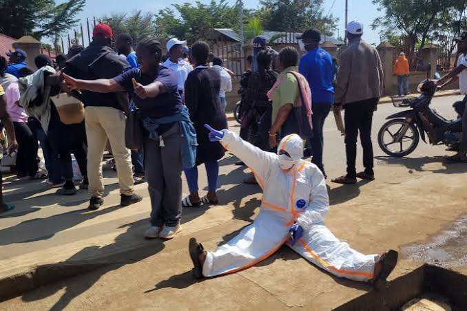 Unpaid Ebola Workers Let Families Touch the Dead