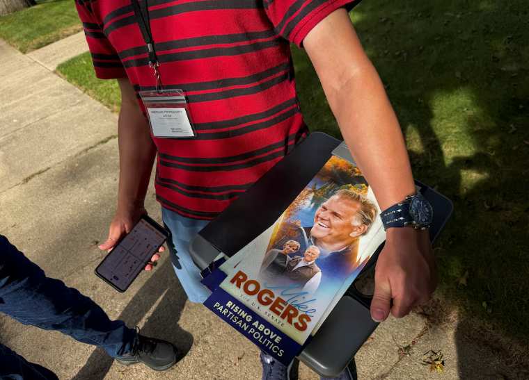 On Michigan doorsteps, Republicans sell Democrats-as-extremists message with mixed success
