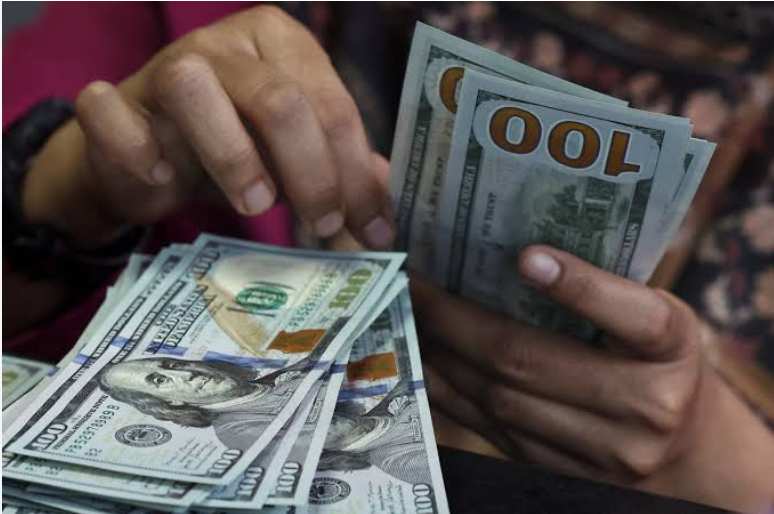 Dollar gets lift from higher yields