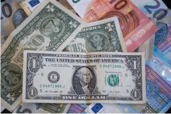 Dollar holds firm as French fiscal woes keep euro on back foot